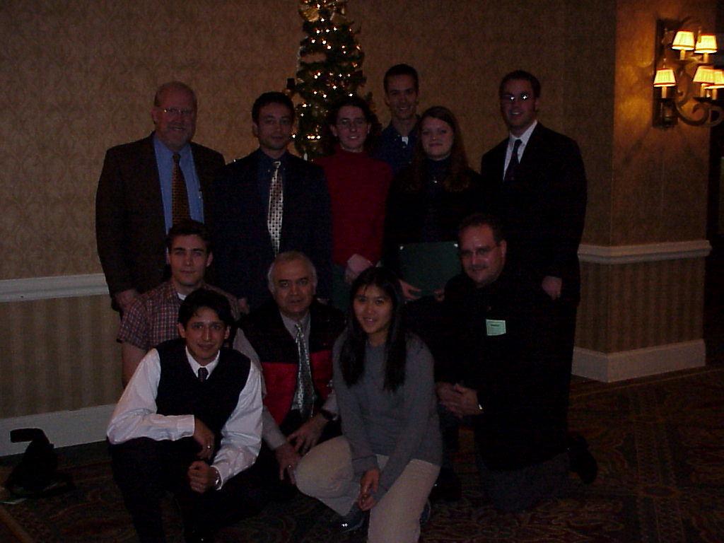  CWRU students at the AFS NEO Scholarship Night. Also in the picture are (from left to right): Bill Sorensen, Director of FEF, David Schwam and Tom Cobitt, 2002 Chairman of the NEO Chapter 