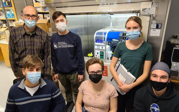 Paco Sheeran (bottom right) with other students who completed research projects in his group.