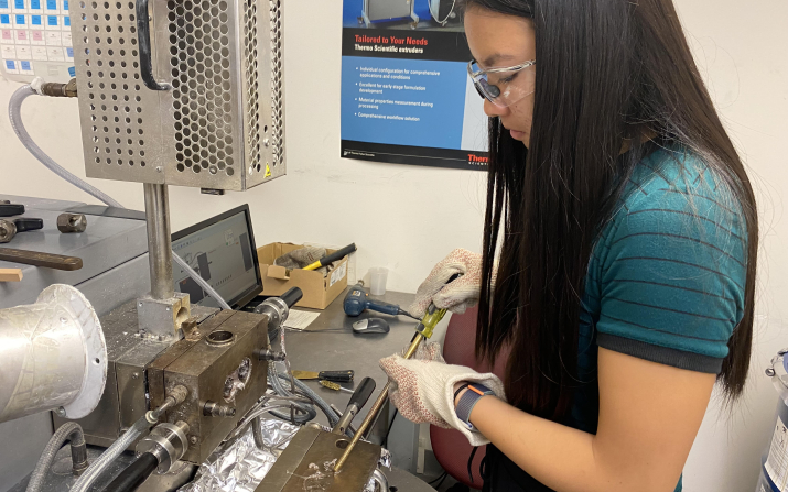 Anne Straits batch mixing in lab.