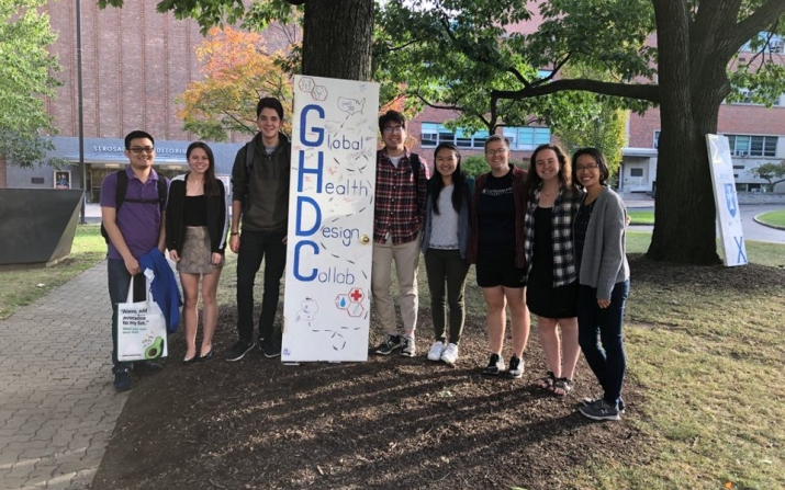 Group shot of pulse ox team holding a GHDC sign