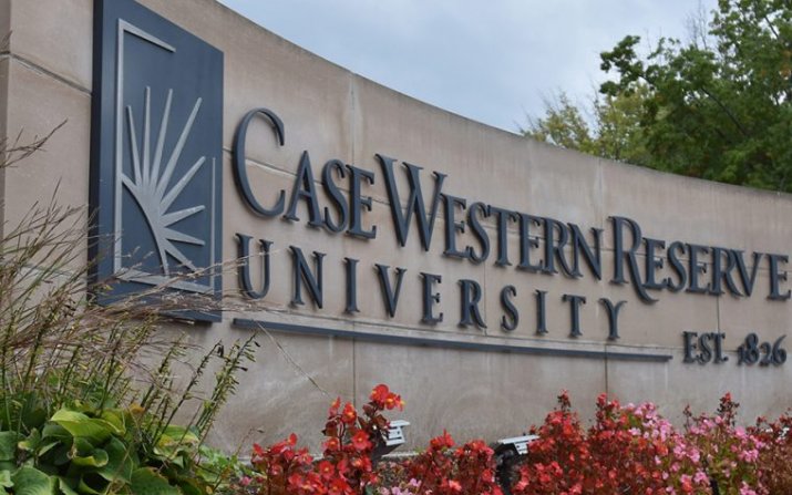 Case Western Reserve University sign with flowers