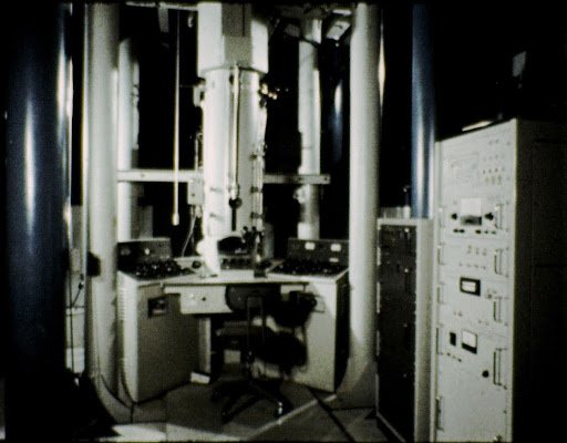 Photo of the three-story tall Hitachi high-voltage TEM installed in the Olin building in 1970 was the fourth of its kind at an institution in the USA