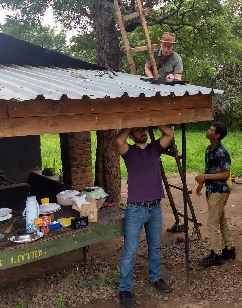 Students work on a solar intallation in Malawi