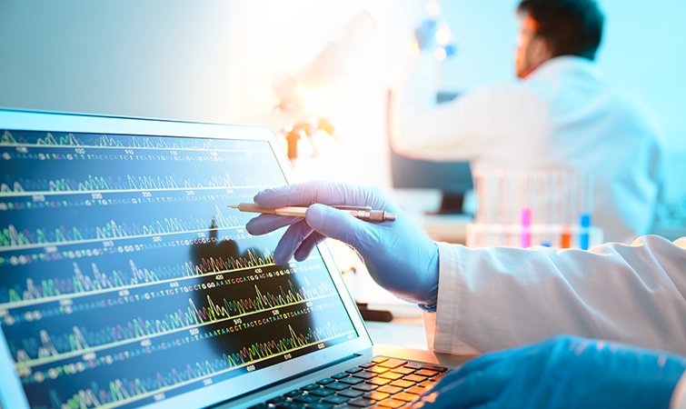 Close up view of an engineering working on a graph on a computer screen