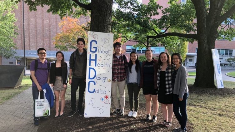 Group shot of pulse ox team holding a GHDC sign