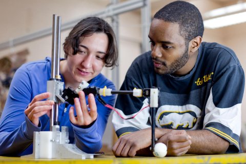 students in mechanical engineering working on project