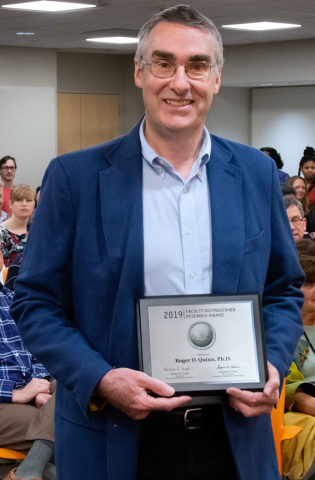 Roger Quinn receiving 2019 Faculty Distinguished Research Award