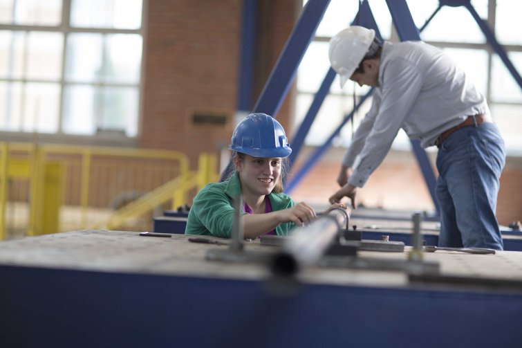 Students working in the civil engineering structures lab