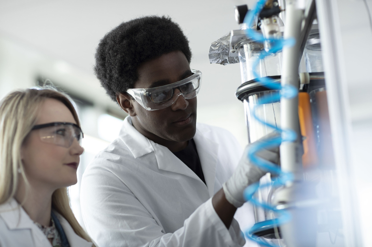 Two students doing research
