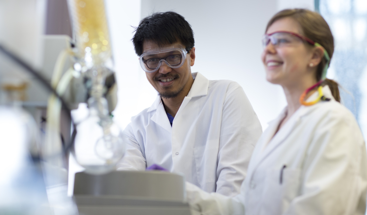 two students in polymer lab